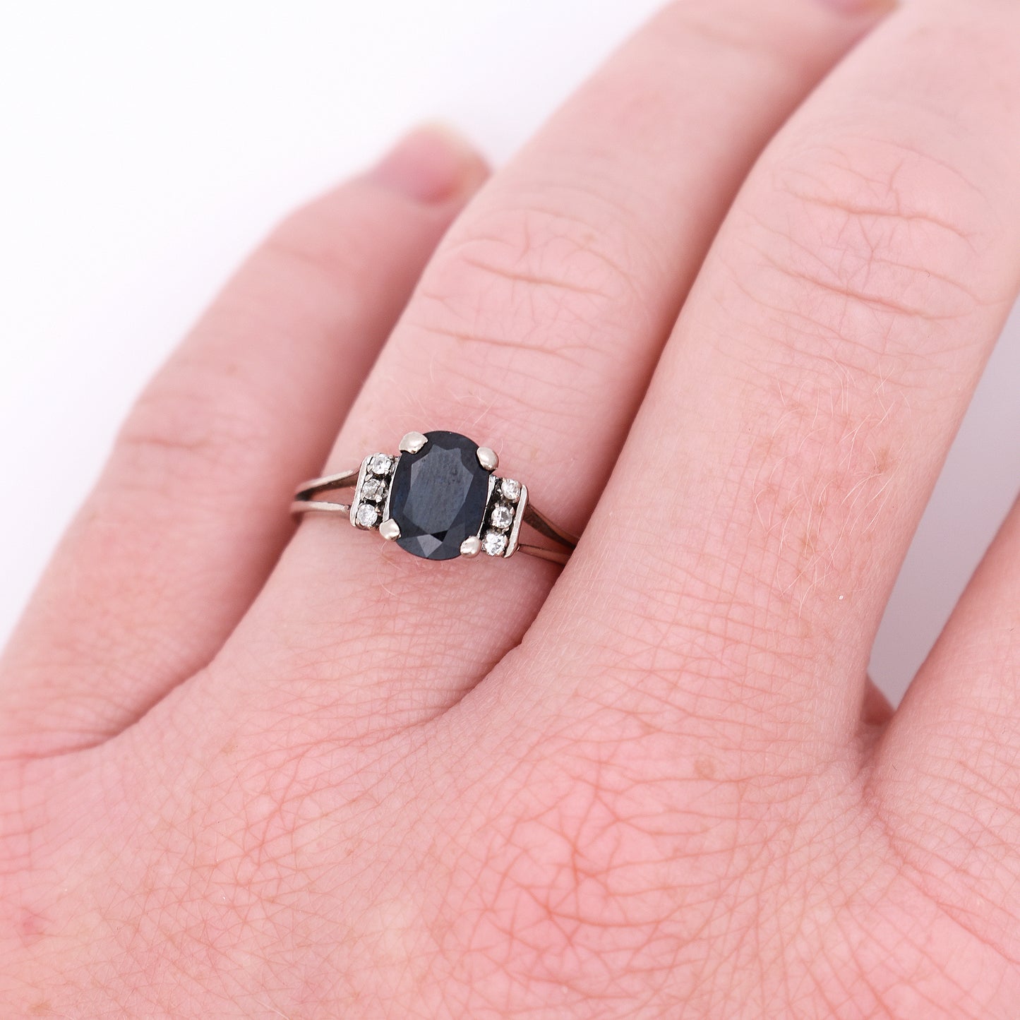 vintage 18-carat gold sapphire and diamond ring, worn