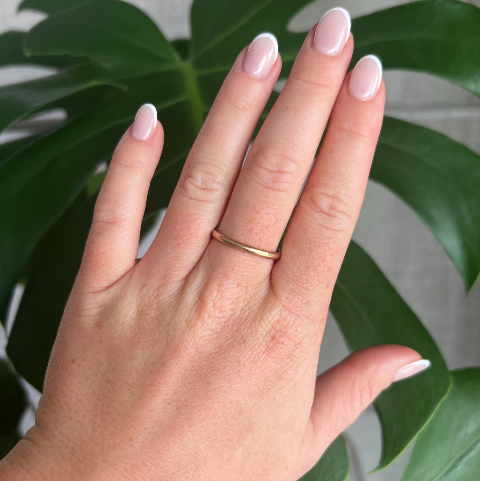 gold wedding ring, worn
