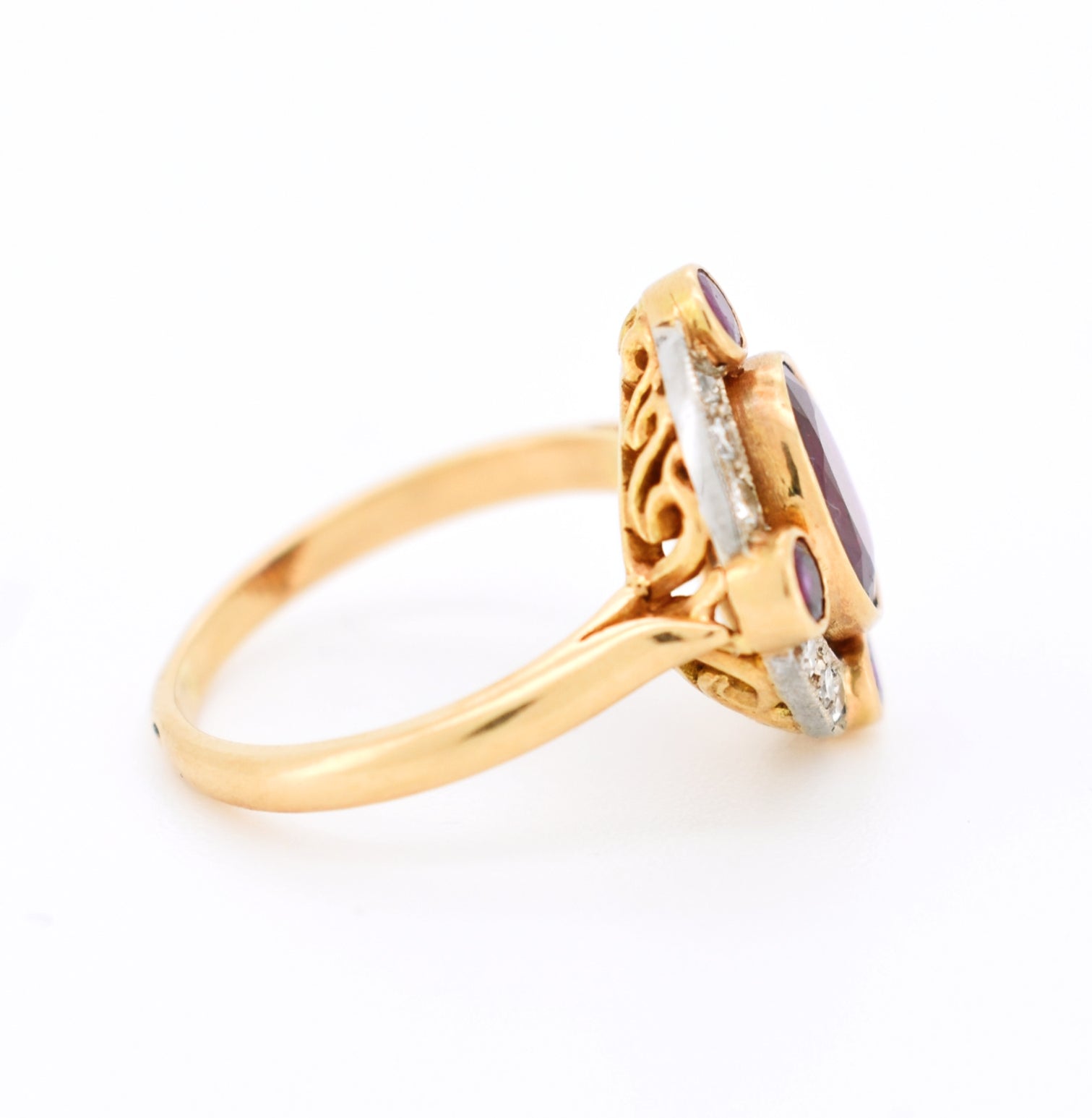 vintage halo ring, 18-carat gold, Burmese ruby and diamonds, right