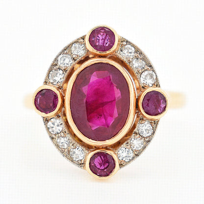 vintage halo ring, 18-carat gold, Burmese ruby and diamonds, face