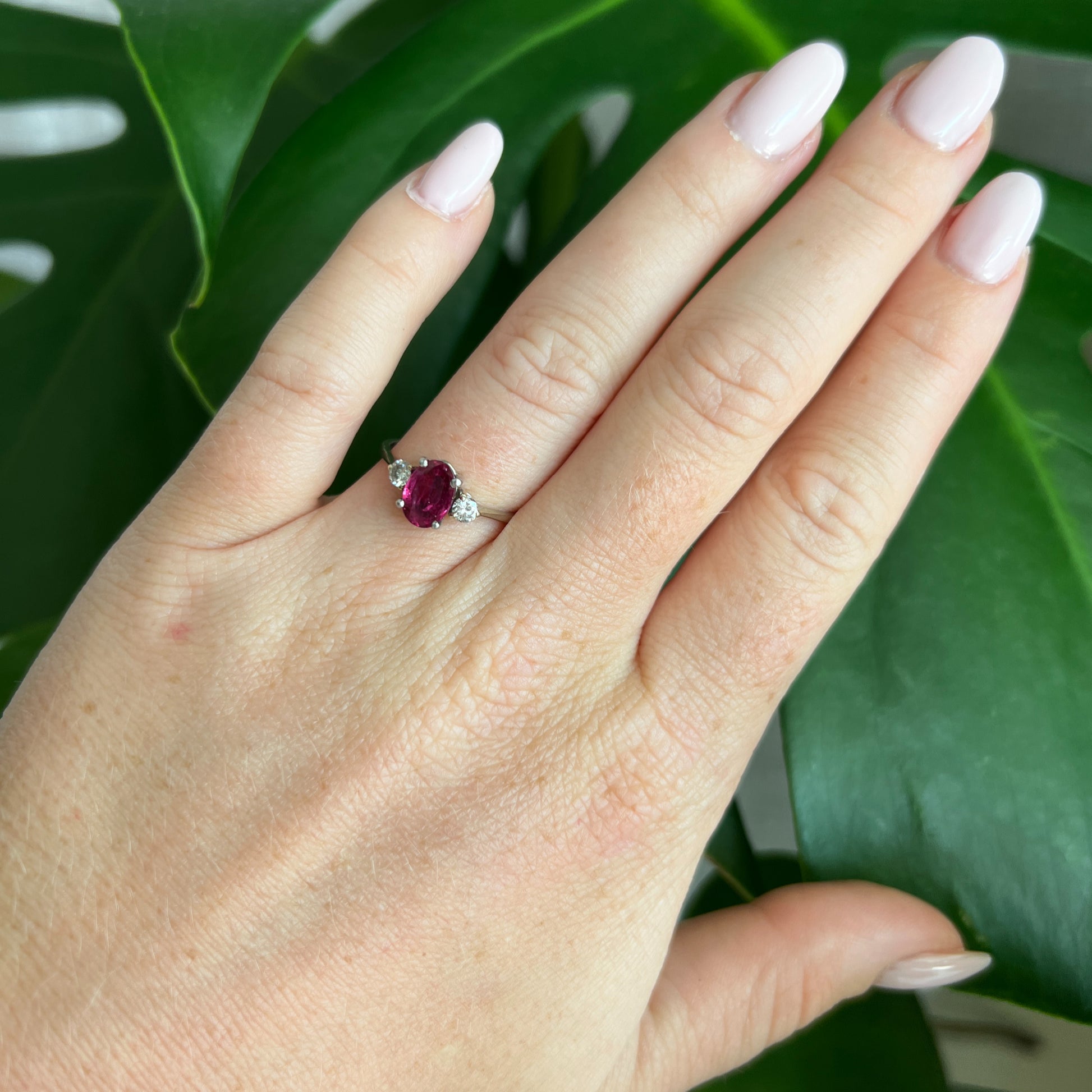 gold diamond ruby trilogy ring, worn